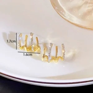 Brincos minimalista de strass e garras de ouro ou prata